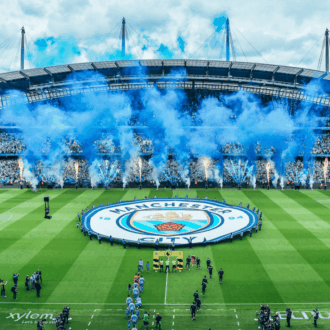 Blue pyrotechnics at Etihad Stadium