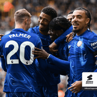 Chelsea FC players celebrating a goal.