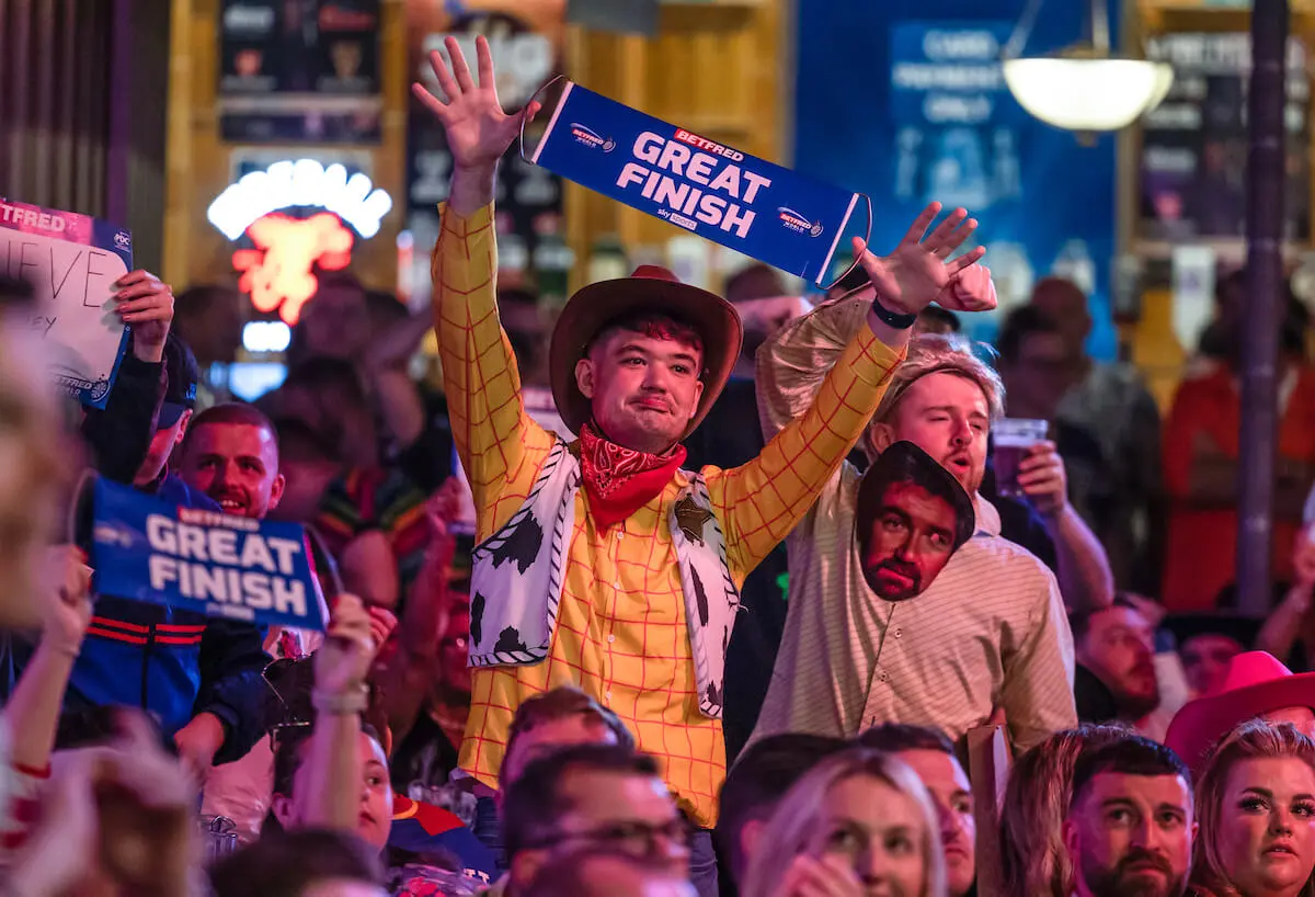 Fans dressed in fancy dress for the World Matchplay Darts.