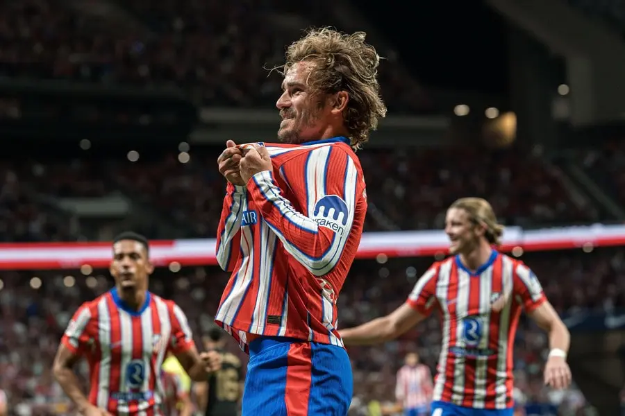 Antoine Griezmann celebrates with his teammates
