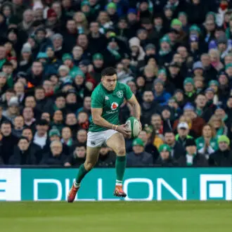 Ireland Rugby player receives the ball.