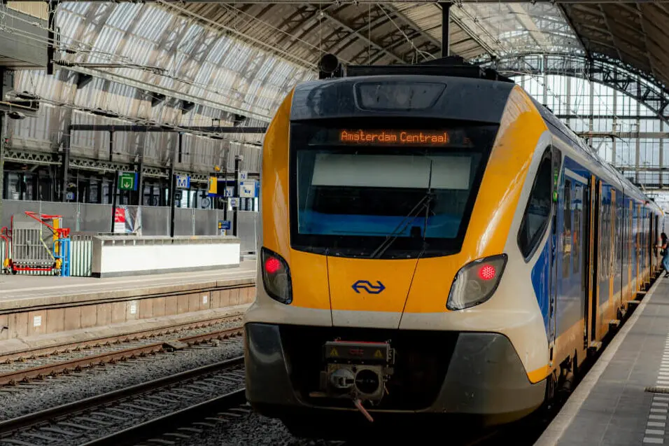 Dutch train going to Amsterdam Centraal.