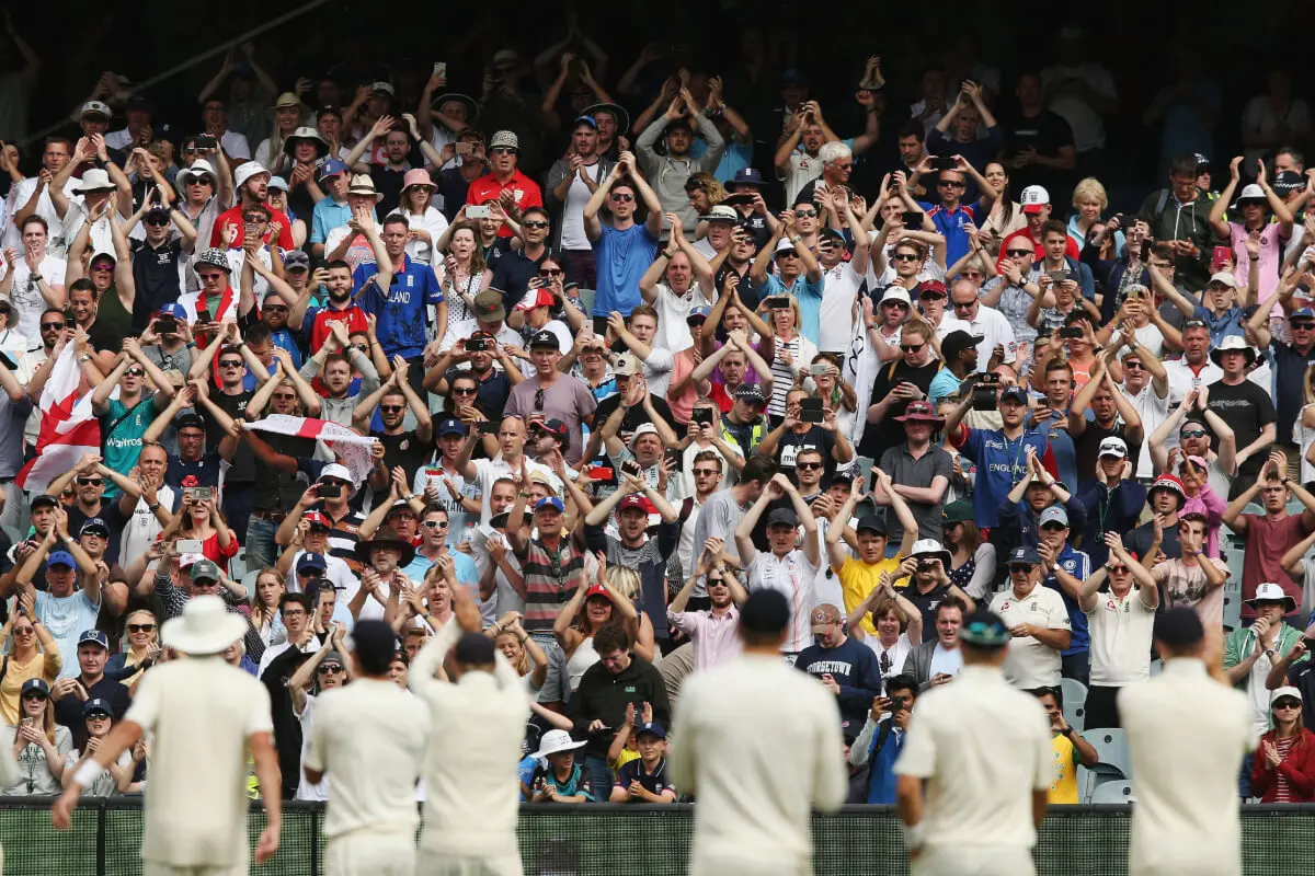 Barmy Army applauding England International Cricket players.