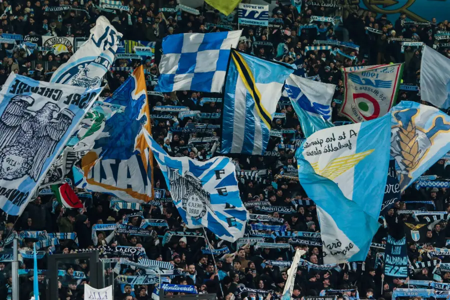SS Lazio fans with flags in the Stadio Olimpico.