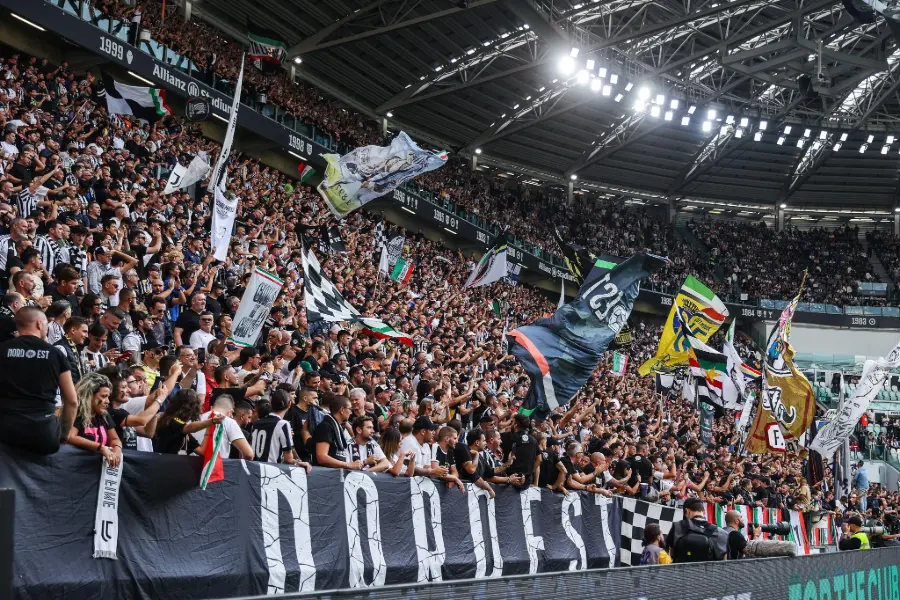 Juventus fans celebrate in the stands at the Allianz Stadium, Turin.