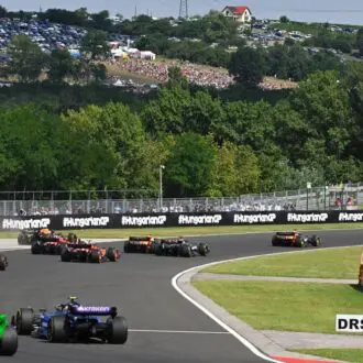 Hungarian Grand Prix, F1 drivers competing around corner.