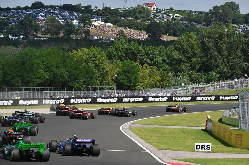 Hungarian Grand Prix, F1 drivers competing around corner.