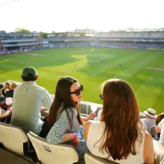 Fans enjoying a day at the cricket at Lord's Cricket Ground in London.