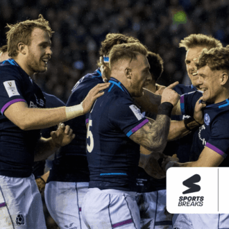 Scottish Rugby players celebrating scoring a try at Scottish Gas Murrayfield.