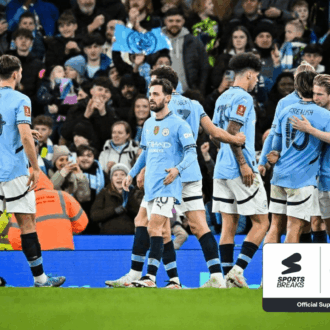 City players celebrating at Etihad Stadium.
