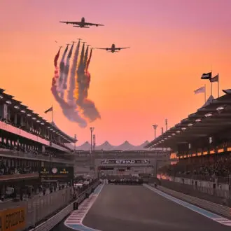 Plane flies over the start line for the Abu Dhabi Grand Prix.