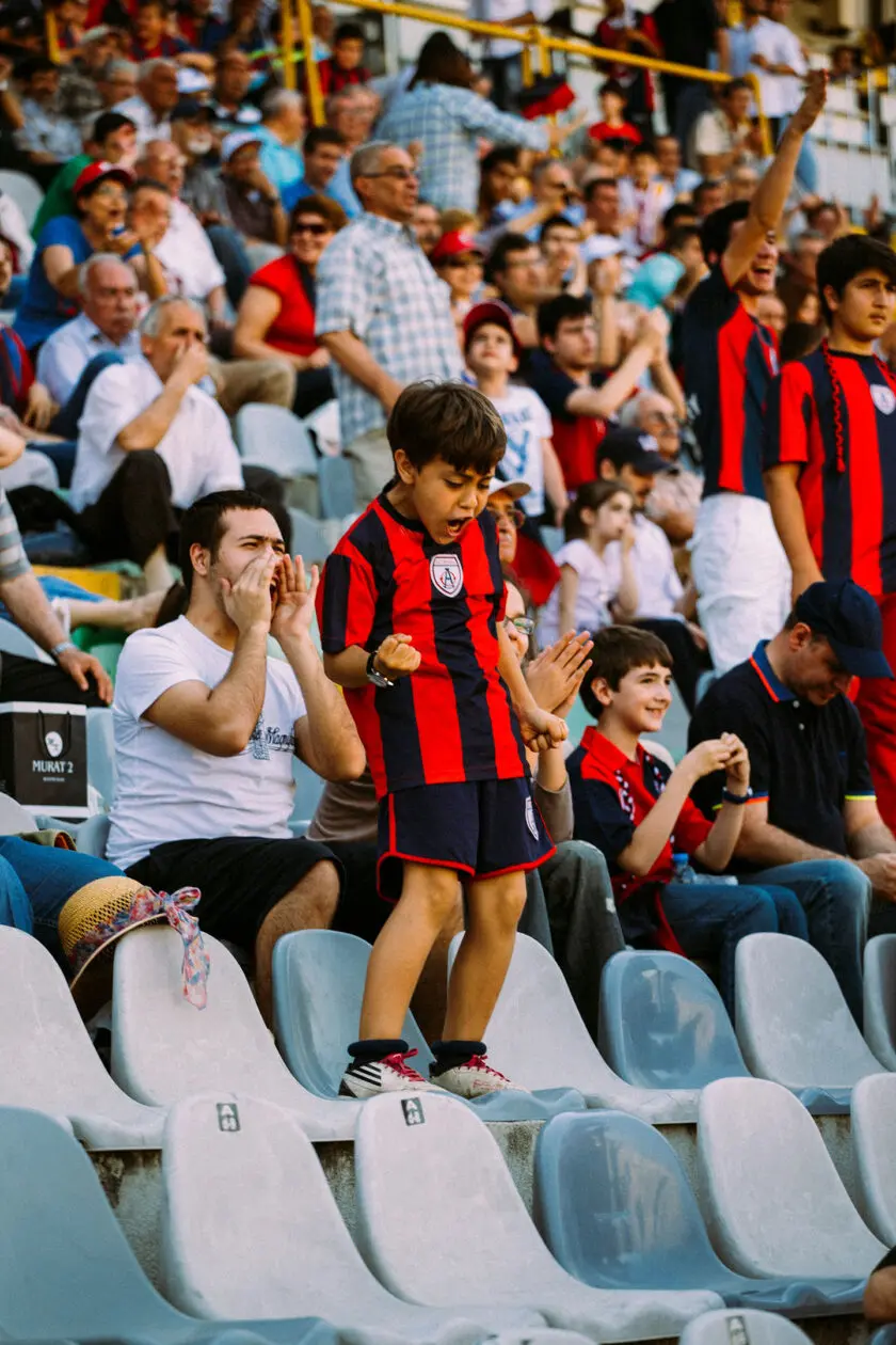 Celebrating Football fan in stands