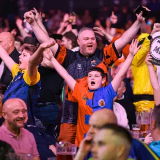 Fans celebrating at Mr Vegas Grand Slam of Darts
