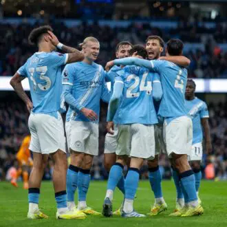 Man City players celebrate against Leeds United.