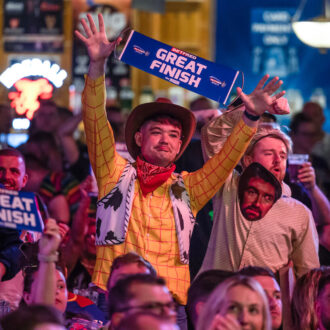Fans dressed in fancy dress for the World Matchplay Darts.