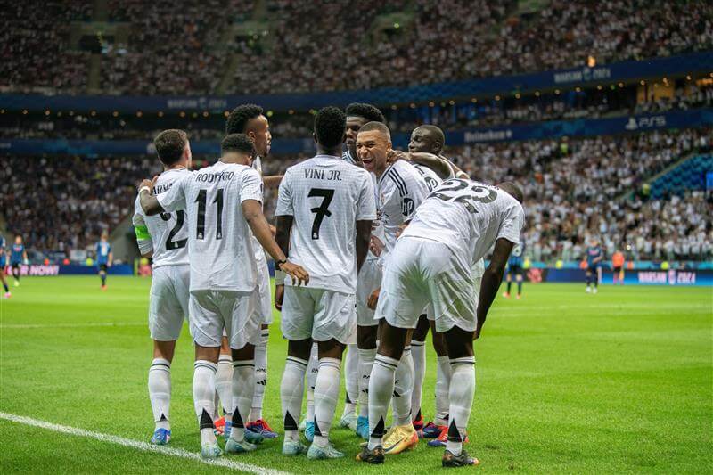 Real Madrid CF team huddle.