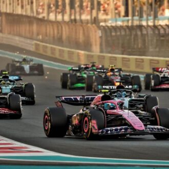 Close up of the F1 cars racing at the Yas Marina Circuit in Abu Dhabi.