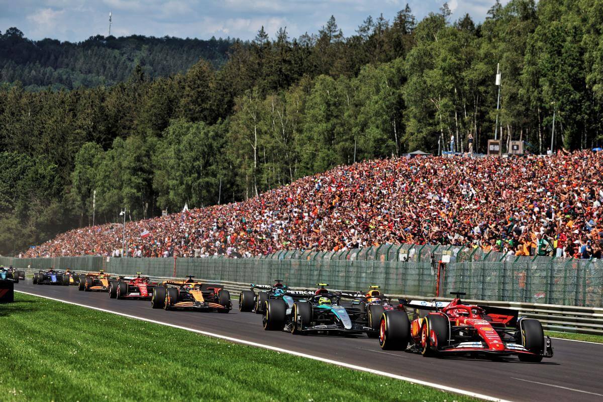 Cars battling it out on the first lap of the Belgian Grand Prix 2024.