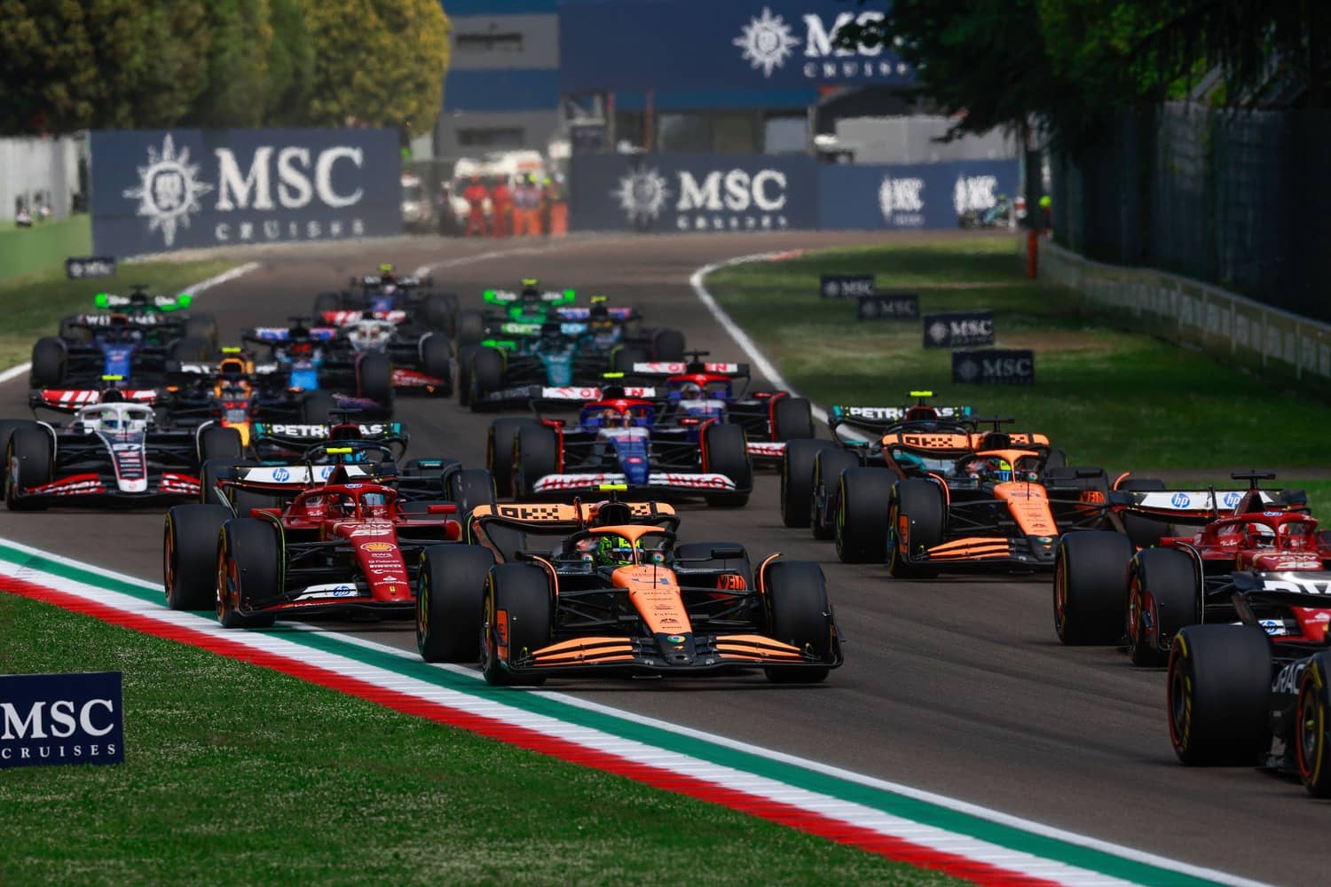 F1 drivers taking a corner during the Imola Grand Prix in Emilia Romagna, Italy.