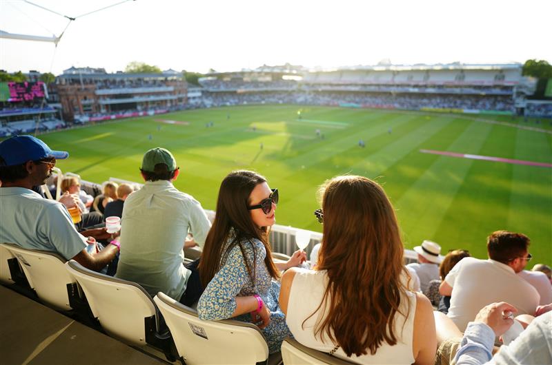 Fans enjoying a day at the cricket at Lord's Cricket Ground in London.