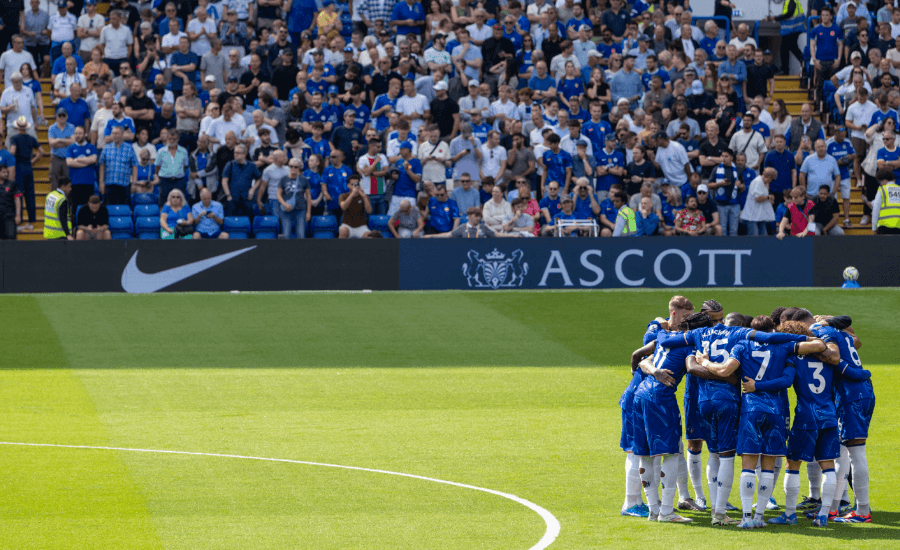 Chelsea FC players in a huddle before kick-of at Stamford Bridge.