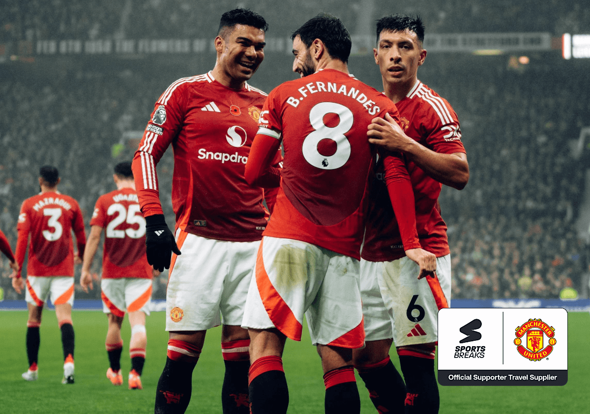 Manchester United players celebrating a goal.
