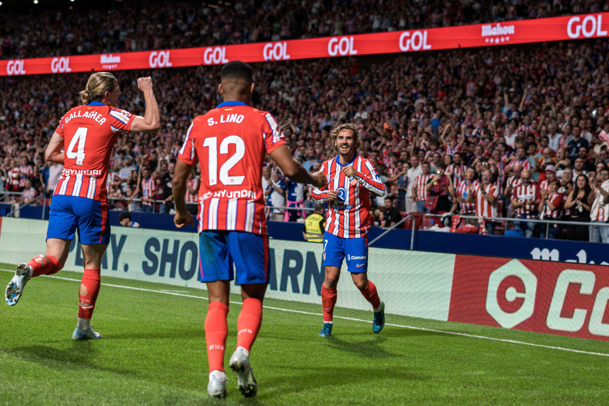Atletico de Madrid players celebrating victory.