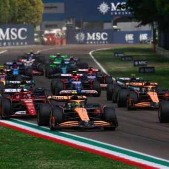 F1 drivers taking a corner during the Imola Grand Prix in Emilia Romagna, Italy.