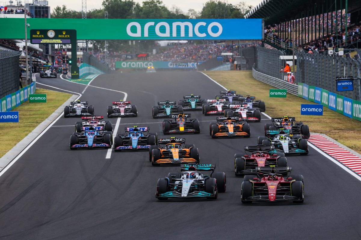 F1 drivers at starting line for Hungarian Grand Prix.